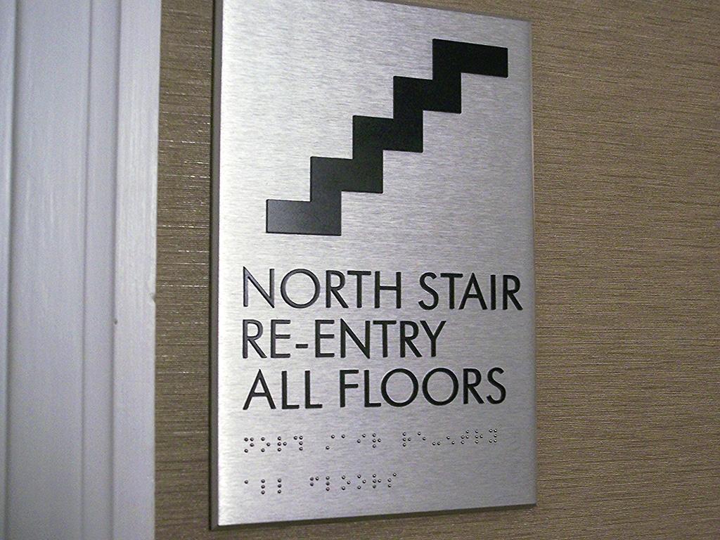 Stairs are displayed on a sign that reads 