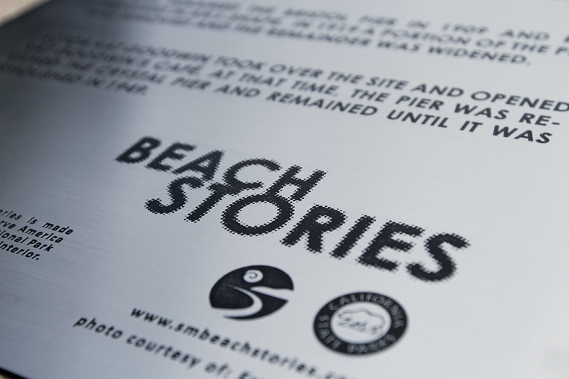 Beach stories text on etched stainless steel plaque