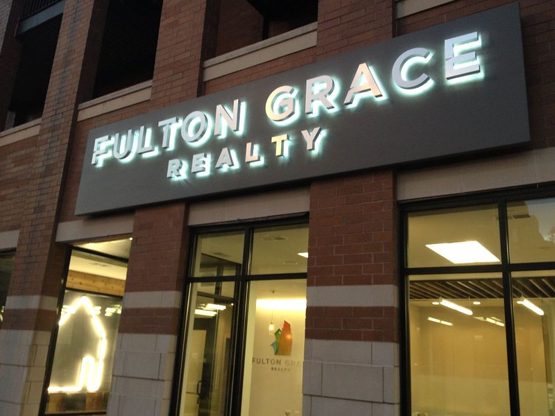 Halo lit panel sign with backlit LEDs