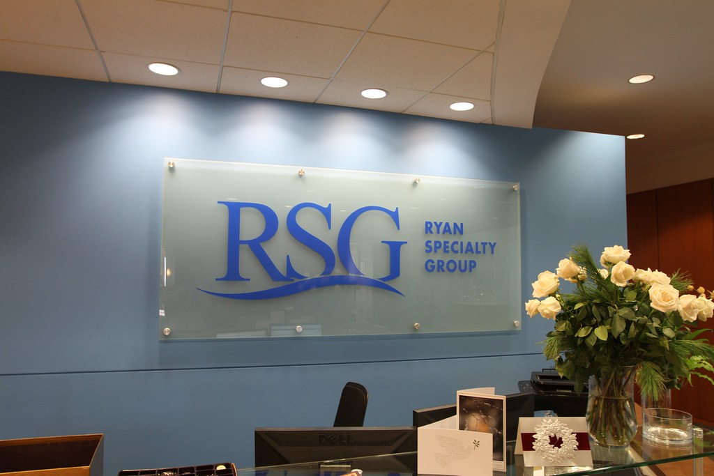 Frosted glass welcome sign with reverse etched logo