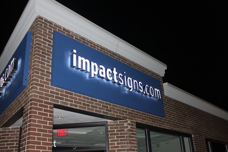 Impact Signs’ logo created with reverse channel letters