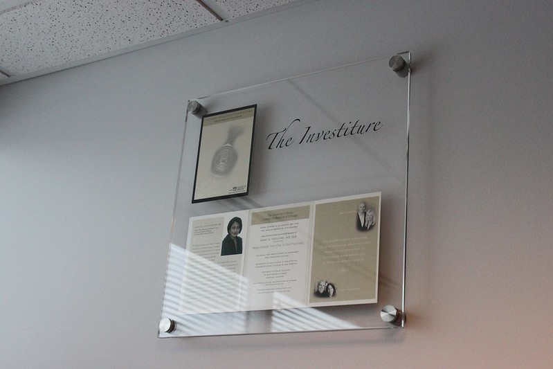 Glass sponsor recognition plaque with photos