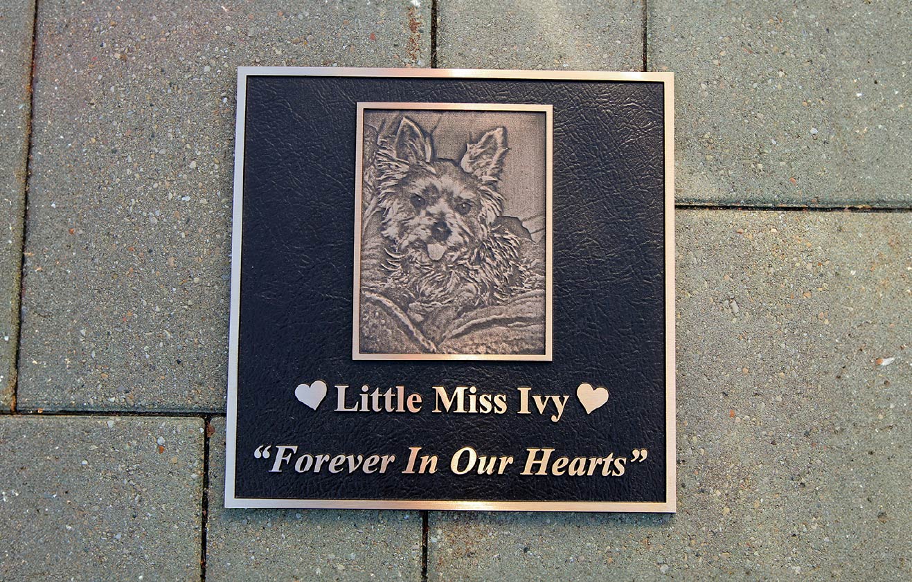 A plaque memorializing a pet.