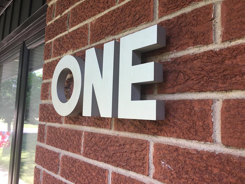 Cast metal letters sign