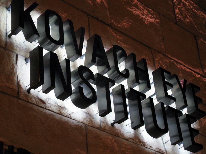 Fabricated stainless steel letters with titanium finish and backlit halo LED lighting effects