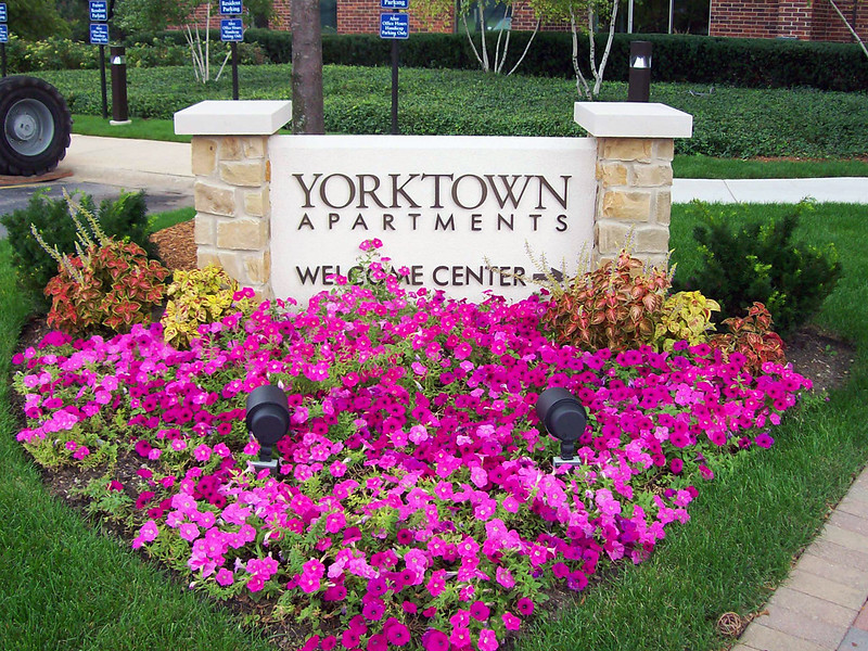 Foam monument sign with stone pillars on either side