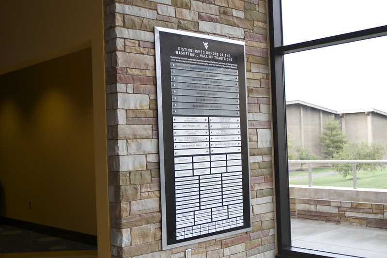 Donor wall with aluminum nameplates and space for additions
