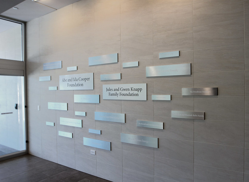 Aluminum plaques in a geometric pattern arranged for the wall of fame display