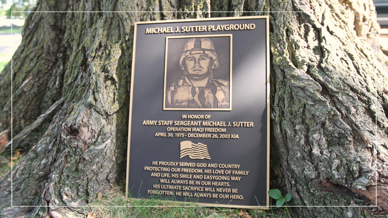 An example cast metal memorial plaque from Impact Signs.