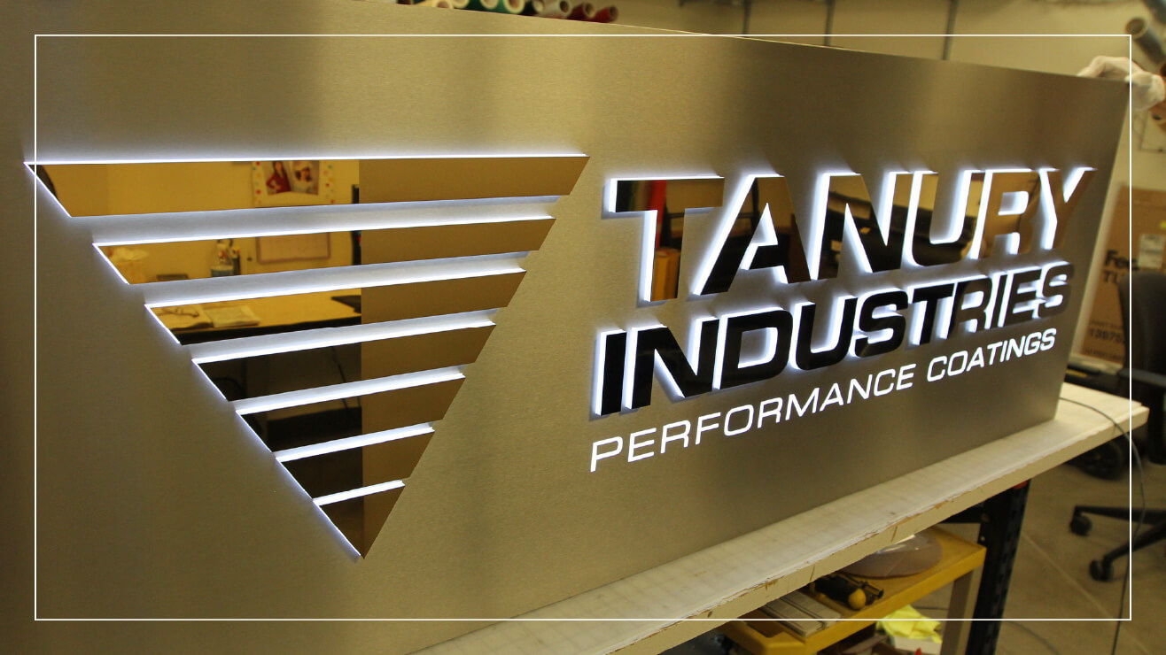 Example of a stainless steel sign with backlighting.