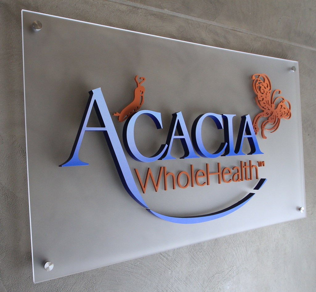 1in thick and 1/4in thick cut acrylic letters assembled on frosted acrylic panel