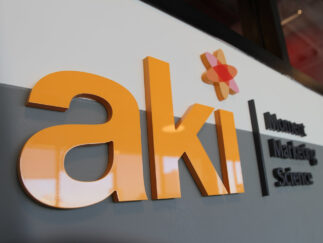 1in thick cut acrylic logo and lettering logo shape has full color UV graphics printed on face