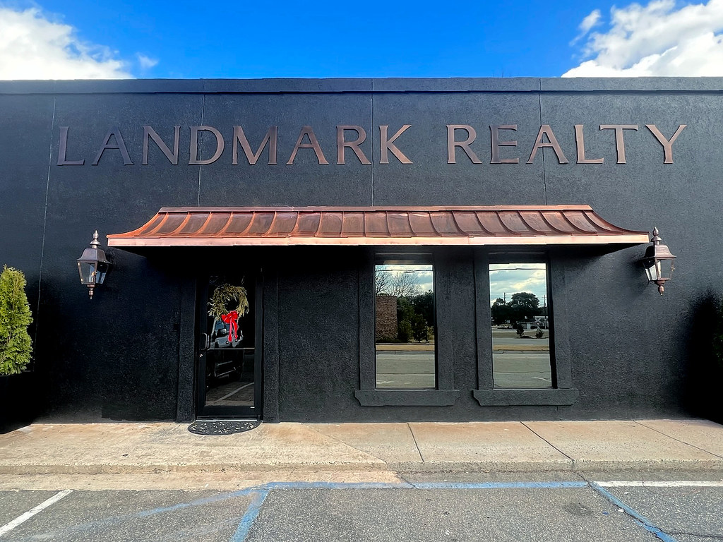 23" height 1/4" thick solid copper in oxidized finish custom font Stettler blind studs for exterior use