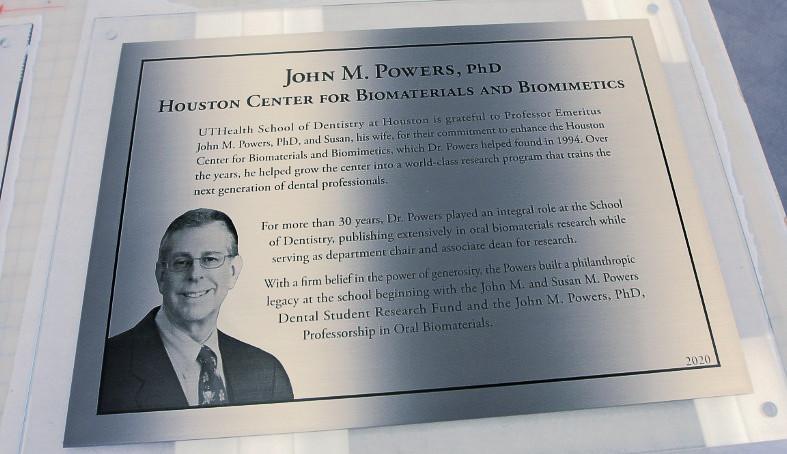 27" x 20" Clear Glass Backer panel with 24"w x 16.75"h x 1/16" Etched Stainless Steel plaque assembled on face Text and (1) photo etched image (4) Stainless steel standoffs in corners for interior drywall mounting