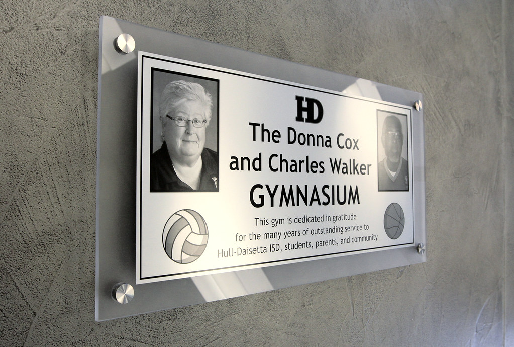 30"w x 15"h frosted acrylic backer with metal photo silver 4 metal standoffs Includes 2 face images 2 sports balls and school logo