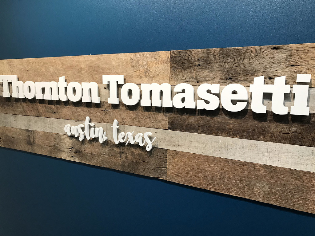 3/8" thick pigmented white acrylic logo lettering