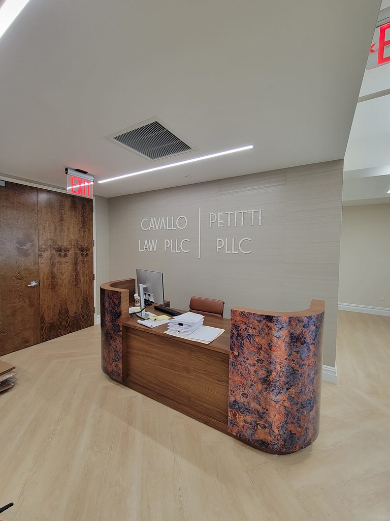 3/8" thick white acrylic lettering for interior law office sign