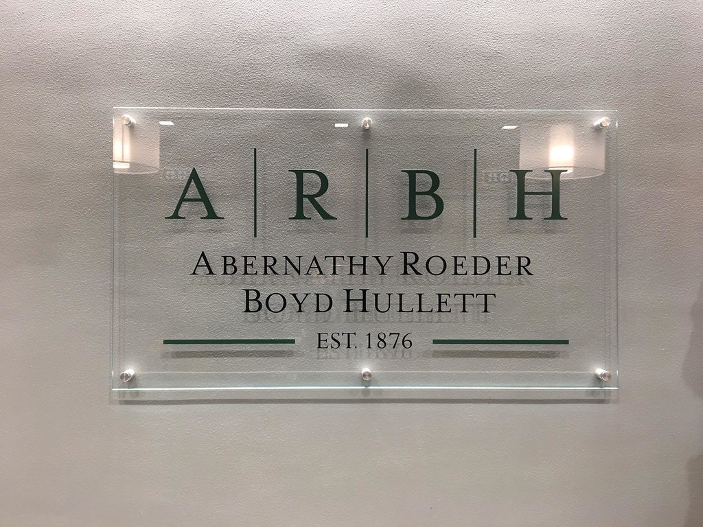 54" x 30" x 3/8" thick clear glass panel Raised aluminum letters 1/4" thick A R B H painted in your green Full names and date reverse etched and paint filled Brushed aluminum stand offs