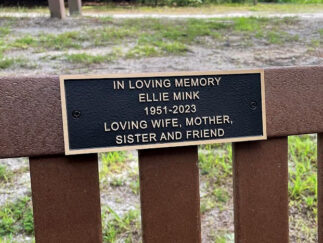 8"w x 2.9"h bronze bench plaque with Satin finish raised lettering and border Recessed paintfilled background in Dark Oxide Leatherette  screws through face for customer mounting exterior use