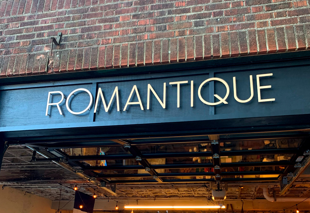 9" height 1/4" thick Aluminum letters painted Aztec Gold Ribbon font Installed with 1" spacers exterior use