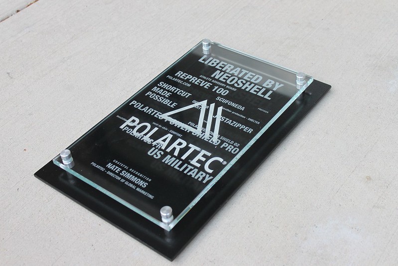 Metal plaque with a glass front 