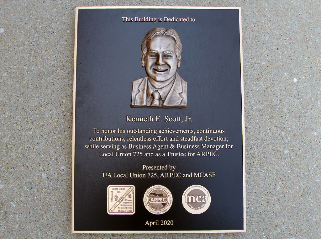 Bronze Plaque with Etched Seal Inserts and Bas Relief photo image
