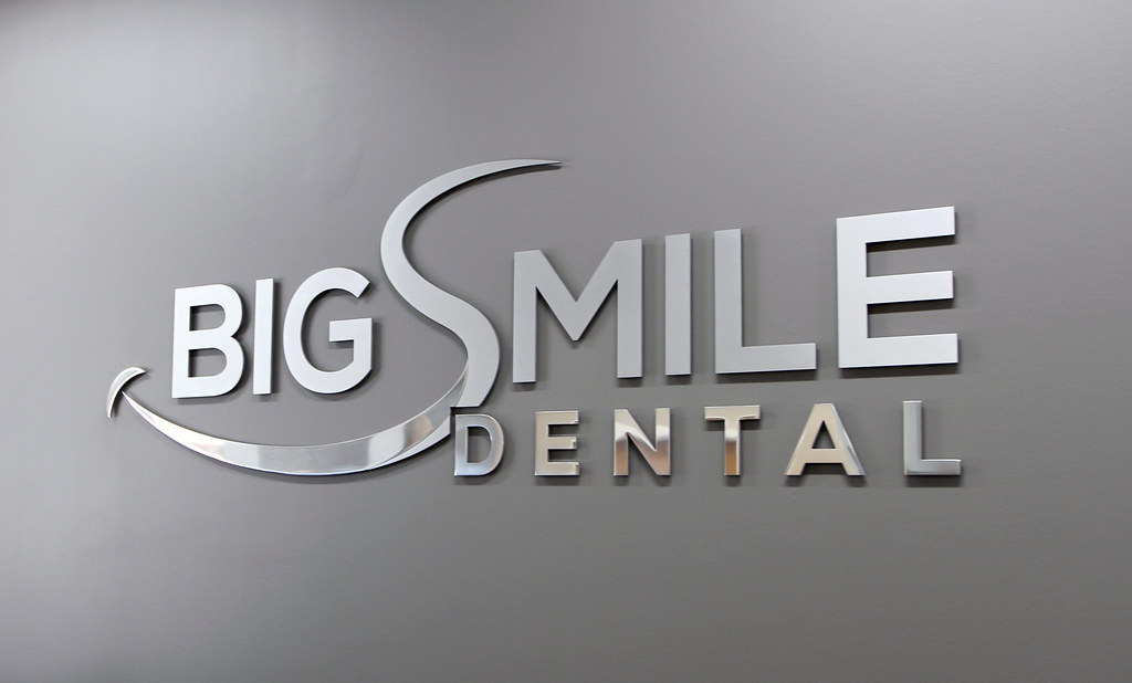 Brushed and polished accent cut metal logo and letters for dental office sign