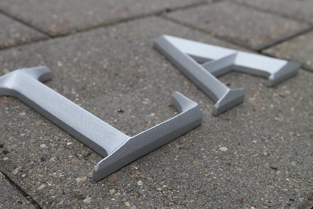 Cast Aluminum ARCHITECTURAL PRISMATIC FONT Standard Blasted finish