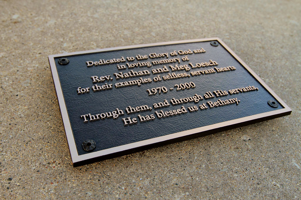Church dedication plaque with R5 rosettes
