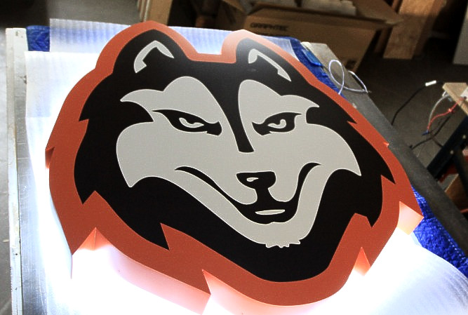 Custom backlit school logo mascot sign fabricated to custom shape of logo masked and painted multicolor