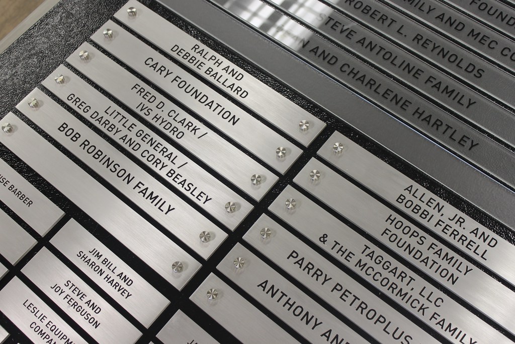 Etched stainless steel donor nameplates assembled on aluminum plaque backer donor levels by size of plaque