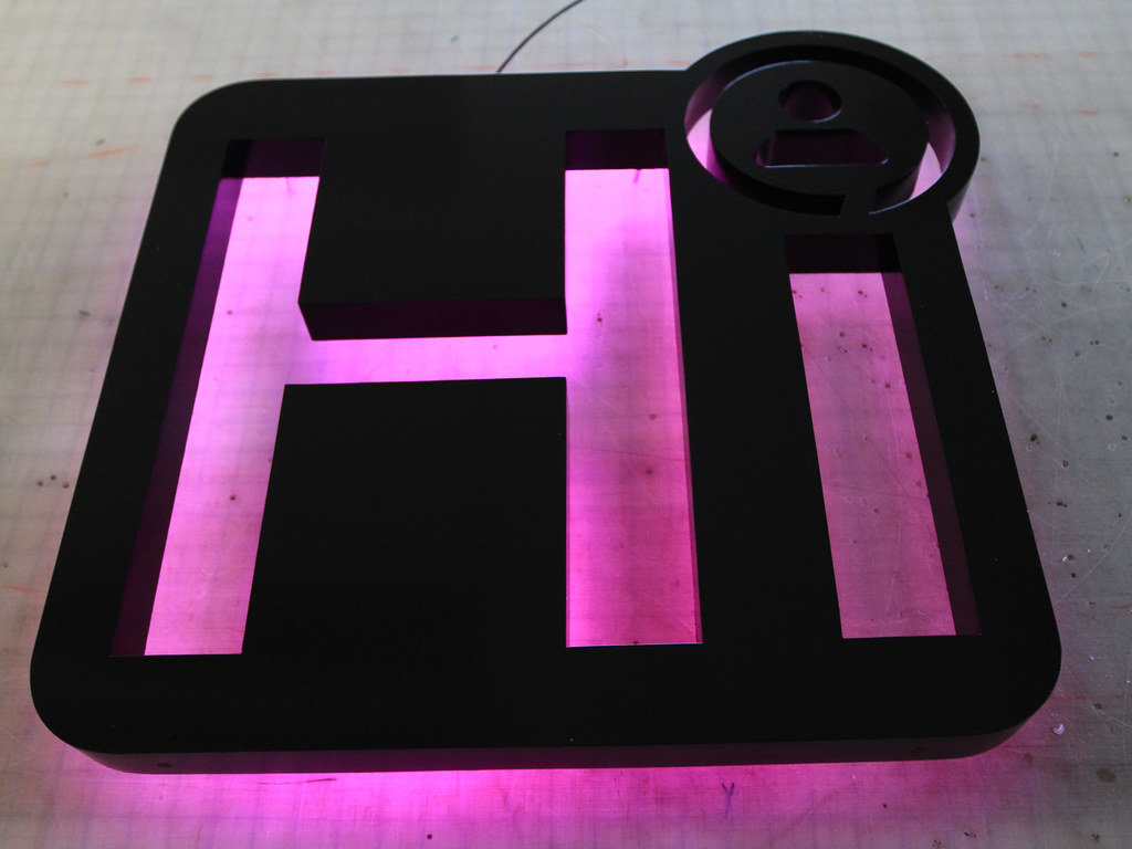 Fabricated reverse cut panel for wall / lighting to show through behind RGB LED's for multicolor display