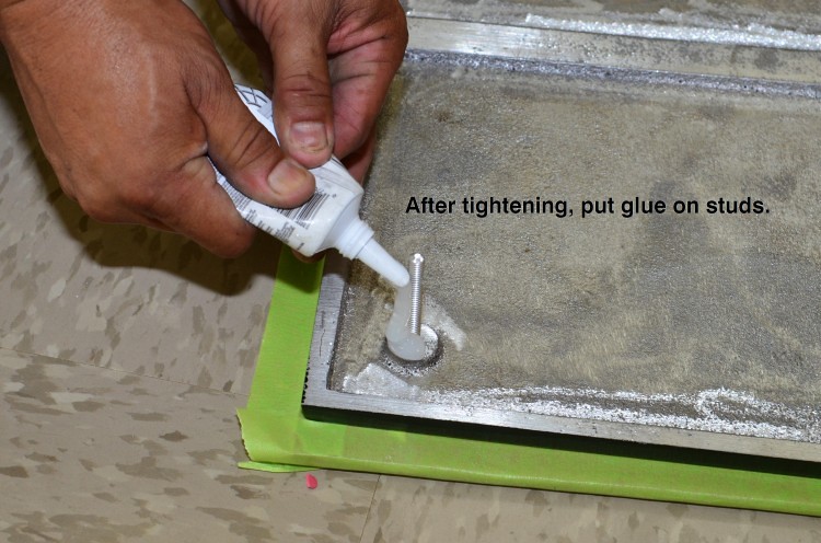 Apply adhesive on studs