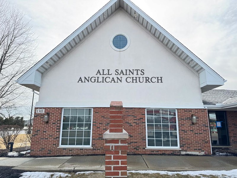 Metal signage letters with Times New Roman font.
