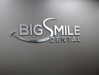 Polished aluminum logo for Big Smile Dental by Impact Signs.