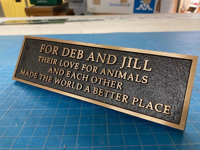 Bronze plaque using professional sign fonts, designed by Impact Signs.