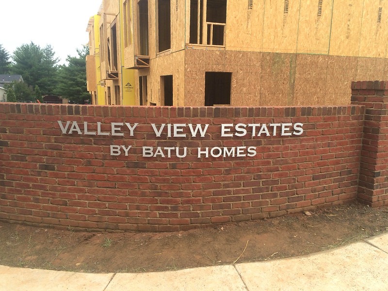Brushed Aluminum Lettering in Standard Copperplate Font Installed on Brick - Exterior