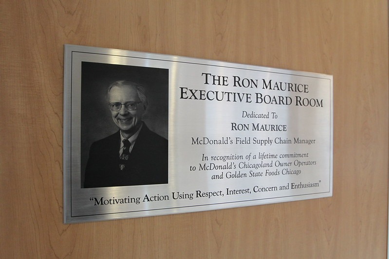 A stainless steel UV-printed dedication plaque for The Ron Maurice Executive Board Room.