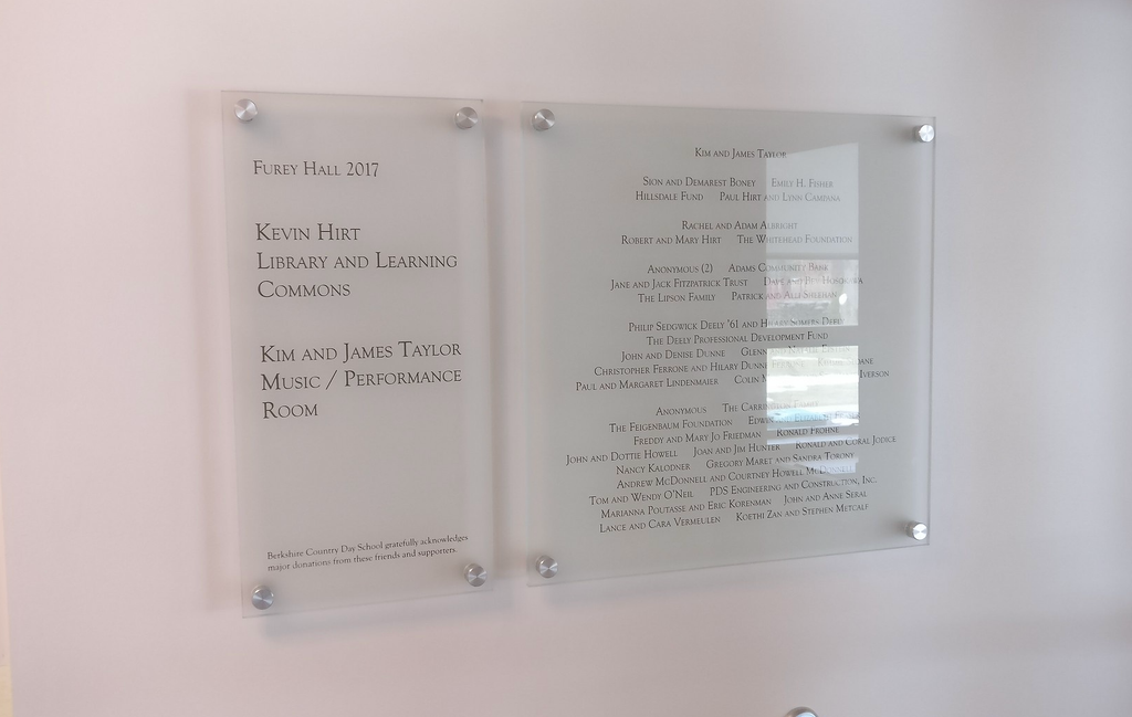An etched glass donor recognition sign for Furey Hall.