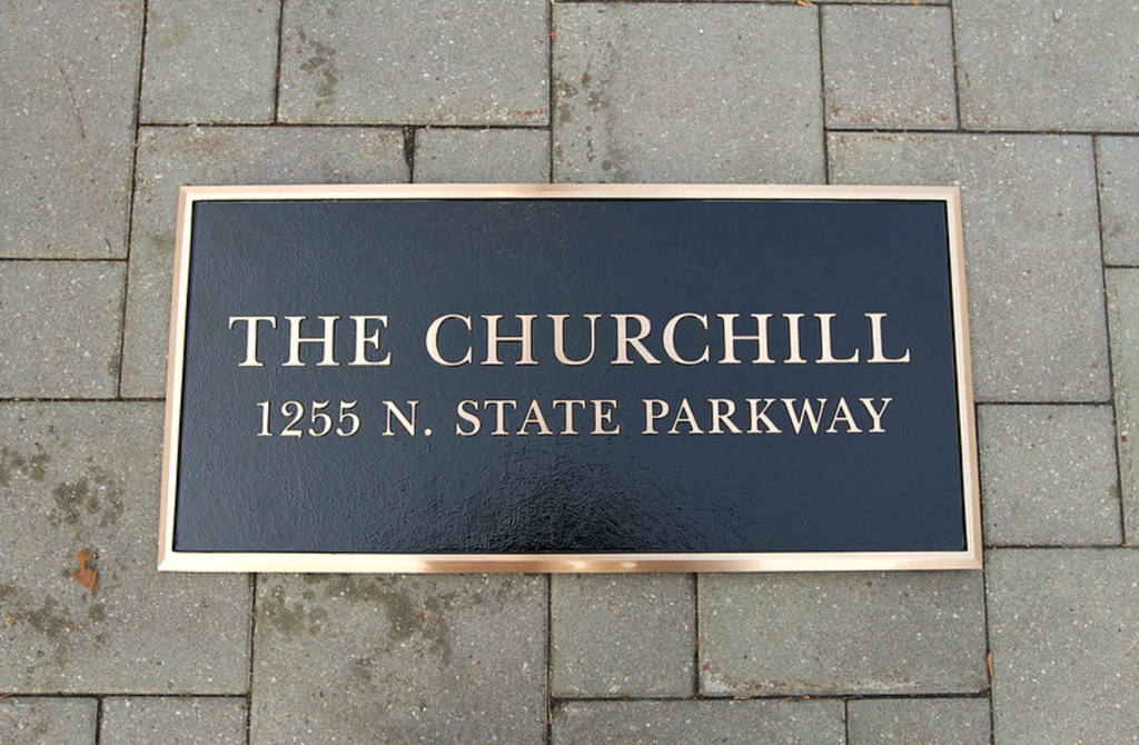 A bronze plaque for The Churchill with a polished finish.